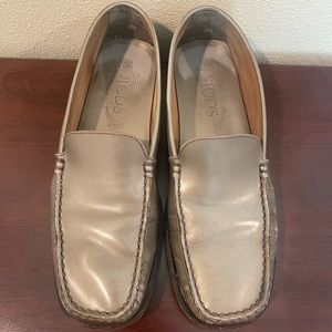 Tod’s women’s Loafers. Size 8.5 metallic gold color.